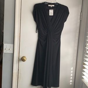 simple black dress with front detail